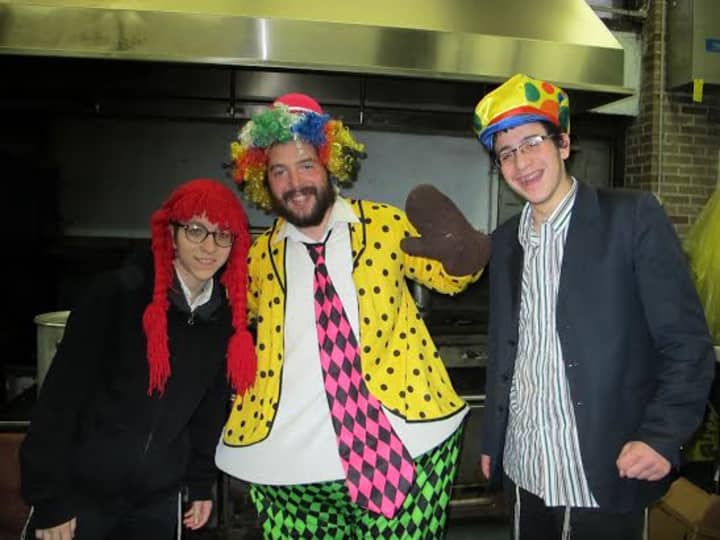Rabbi Mendy Hurwitz dressed up as a clown for Chabad of Yonkers&#x27; Purim celebration.