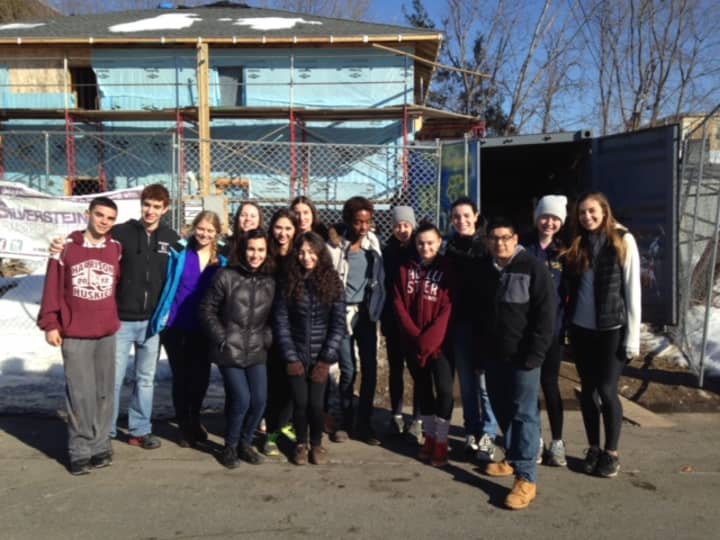 Members of the Harrison High School Youth Volunteers of Harrison (YVH) Club participated in the building of a house by Habitat for Humanity in Yonkers. 