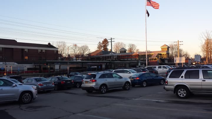 The Metro-North parking lots next to the Harrison Train Station as they looked Thursday evening. They are the site of a new mixed-use housing project.