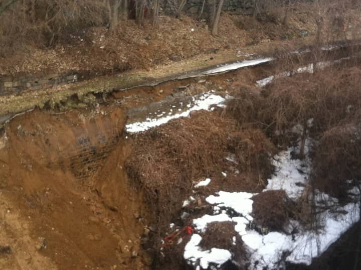 A mudslide leaves residents at 95 Walsh Road out of their homes for at least two weeks. 