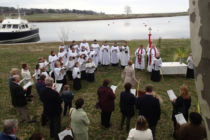 A previous Palm Sunday service at the Perry Green in historic Southport Harbor for Trinity Church.