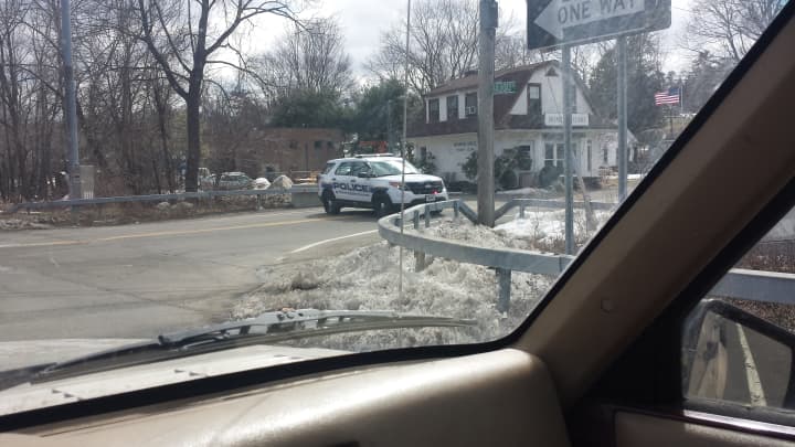 A Metropolitan Transportation Authority police car blocked Lakeview Avenue in Valhalla on Wednesday after crossing gates got stuck in the down position. They were working by 3 p.m. Flares were used to detour cars from the other side of the tracks.