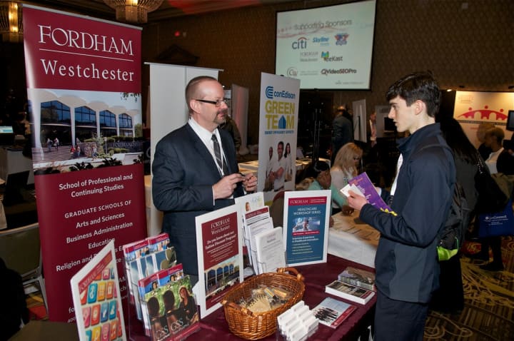Grant Grastorf, academic operations administrator for Fordham University&#x27;s campus in Harrison talks to a prospective student.