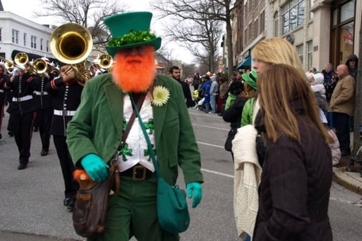 One of the many characters in last year&#x27;s St. Patrick&#x27;s Day Parade greets visitors along Greenwich Avenue.	