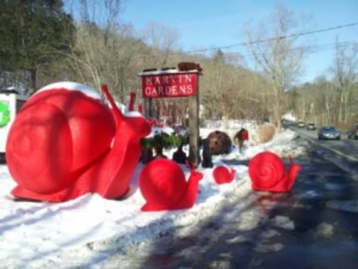 The giant red snails will head home as Marvin Gardens closes for good. 