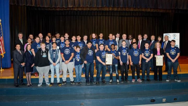 Yonkers Mayor Mike Spano, along with Yonkers School District, ConEdison and the Generoso Pope Foundation, recognize the Saunders Trades &amp; Technical High School Robotics Team at a Wednesday morning ceremony. 