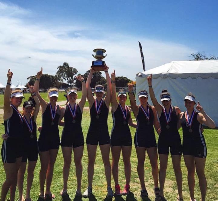 Girls on the Saugatuck Rowing Club team celebrate after winning the gold medal in the Varsity 8+ at the San Diego Classic.