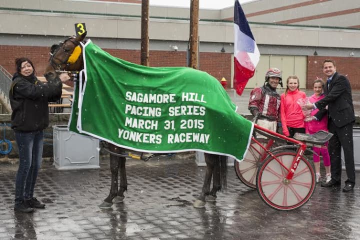 Rediscovery and George Brennan earn trophy at Yonkers Raceway.