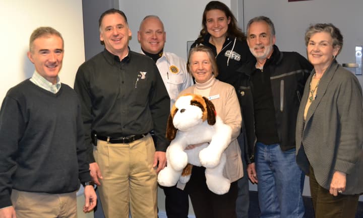 Rye Derby Committee members pictured L to R: Conor ODriscoll, Gregg Howells, Lt. Scott Craig, Sally Wright (holding Darby the Derby Dog), Susan Gervais, Russell Gold and Penny Cozza. 
