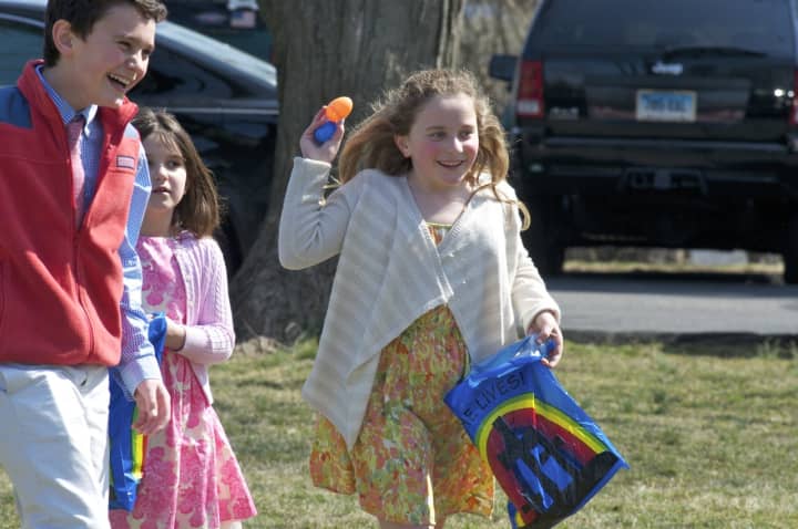 Kids enjoy Easter egg hunting at the Second Congregational Church in Greenwich on Sunday.