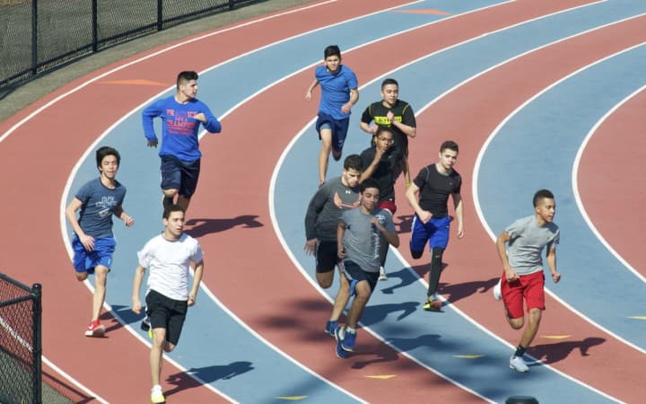 The Danbury High boys track and field team preps for the upcoming season.