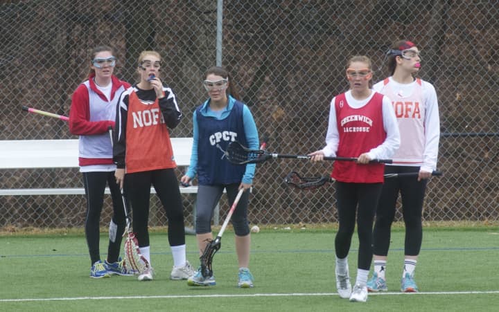 The Greenwich  High girls lacrosse team practices for the upcoming season.