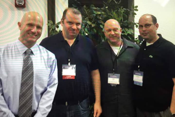 From left, Deputy Superintendent Jeff Gorman, Standards Administrator for Technology Joseph McGrath, Davis Middle School Principal Joshua Whitham and Eric Sheninger, technology pioneer educational leader at the Future Ready Summit.