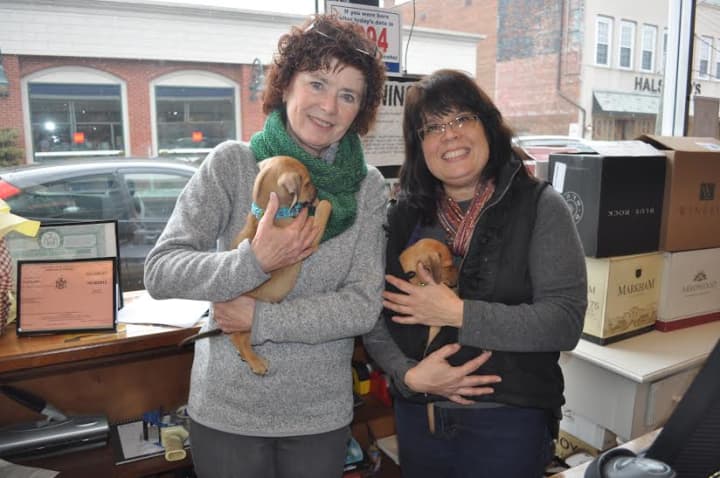 Laura Kelly and Theresa Andre holding puppies from Pet Rescue