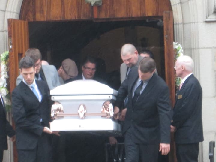 Pall bearers carrying Lacey Carr&#x27;s casket at her funeral Friday.