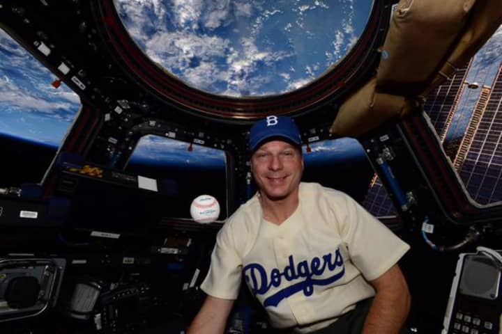 Astronaut Terry W. Virts honors  Jackie Robinson by wearing #42 aboard the International Space Station. 