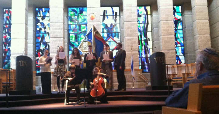 Musicians perform during the annual Holocaust commemoration at Temple Sholom on Wednesday.