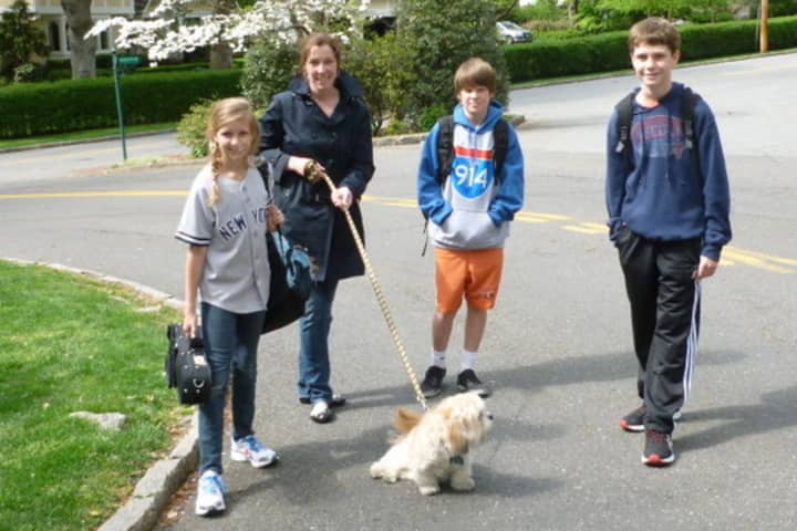 Bronxville residents Eileen Marshall, along with dog Teddy, escorted her namesake daughter, Eileen, son John and their friend Eddy Connors (in shorts) back home from school as part of the schools week-long Walk to School initiative.