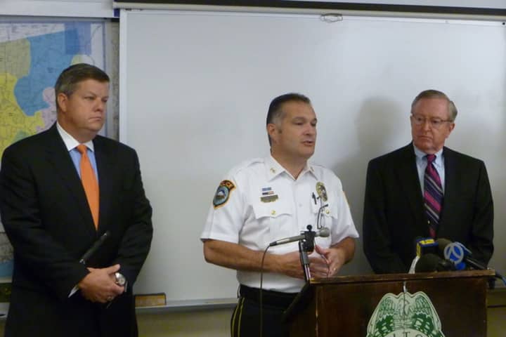 Wilton Police Chief Michael Lombardo, left, speaks during an August 2012 press conference to announce the arrest of a juvenile in connection with the 2008 death of 13-year-old Nicholas Parisot. 