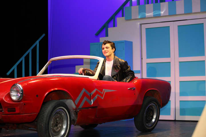 A John Jay student plays the role of Danny Zuko in &quot;Grease.&quot;