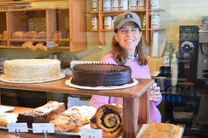 Behind the treats counter at Ross&#x27; Bread is new owner Amy Freidenrich. 