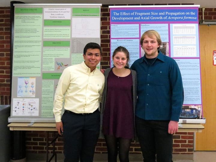 Students from Croton-Harmon High School show off their work at the annual science symposium in March.