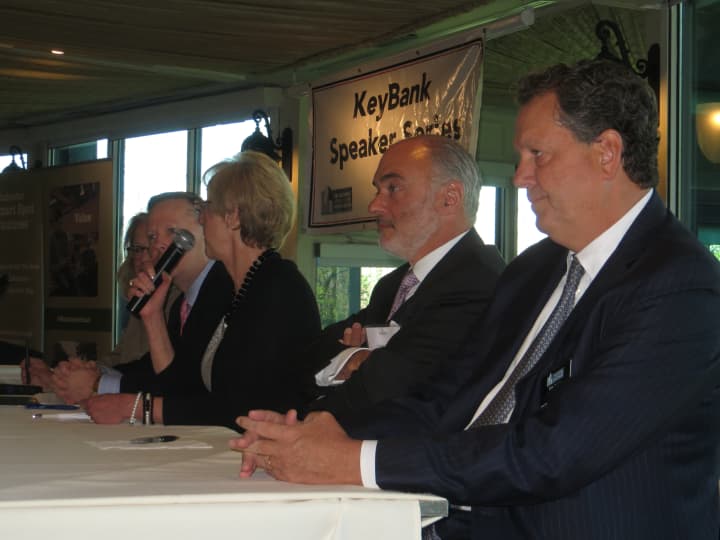 Marsha Gordon, president of the Business Council of Westchester, at the microphone, seated next to Robert Weisz of RPW Group and Tim Jones of the Robert Martin Co.