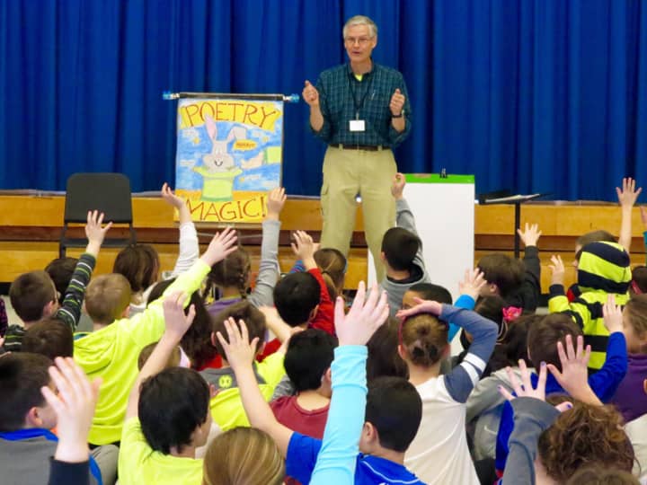 Poet Ted Scheu offered advice to Increase Miller Elementary School second-graders during a recent visit.