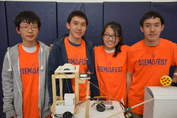 From left, Horace Greeley High School students Mingjun Xiao, Eric Wang, Hanzhi Zou and Mark Wang. The students were involved in creating a simulated city that incorporates programming and engineering skills.