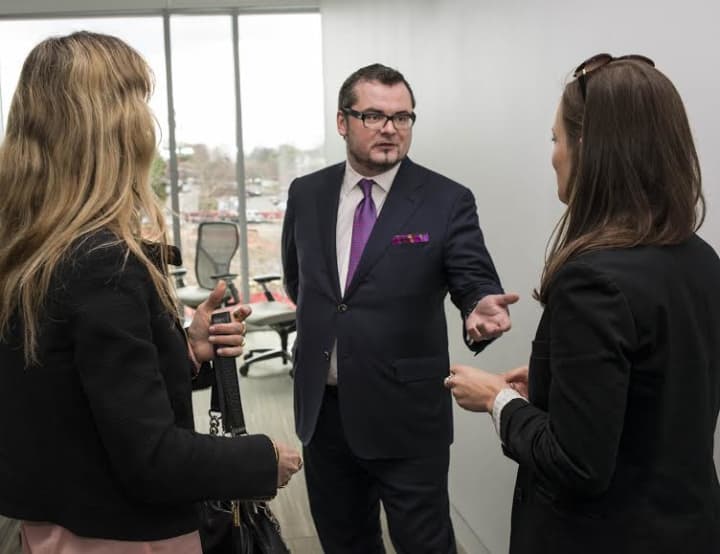 Luxembourg General Counsel Jean-Claude Knebeler visits with study abroad students in the Martire Business &amp; Communications Center at Sacred Heart University on April 23. SHU has a campus in Luxembourg and in Fairfield. 