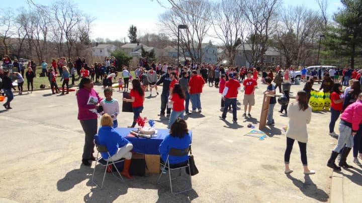 Crowds turn out for the annual Community Day run by students at Sacred Heart University at the North Branch Library and Community Center in Bridgeport. 
