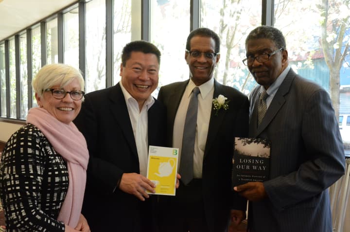 From left, Mary Pat Healy, executive director of Bridgeport Child Advocacy Coalition; state Sen. Tony Hwang (R-28); Bob Herbert, author and keynote speaker; and Charles B. Tisdale, executive director of Action for Bridgeport Community Development.