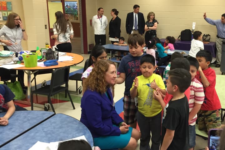 U.S. Rep. Elizabeth Esty visits with students at the supper program at Ellsworth Avenue Elementary School in Danbury.