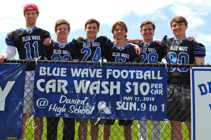 Darien High School&#x27;s football captains get ready for Sunday&#x27;s car wash. The players (left to right) are: Tim Graham, Hudson Hamill, Christian Trifone, Colin Minicus, Bobby Trifone and Mark Evanchick.