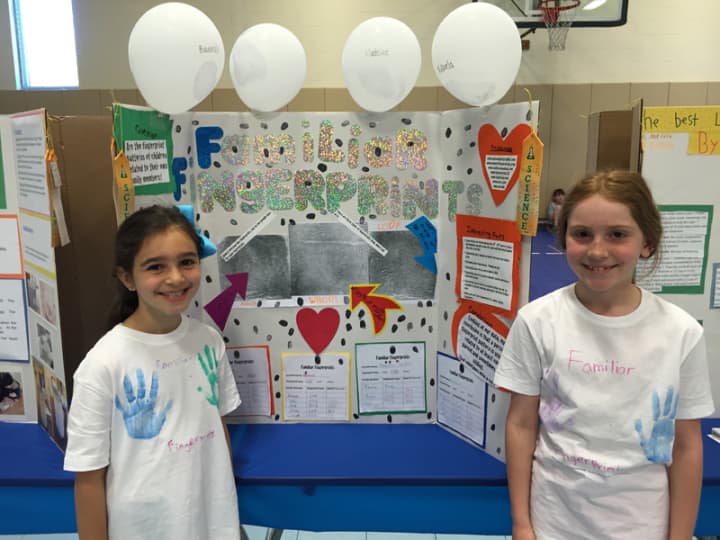 Madeline Galgano, Julia Newmann, Mikaela Parker and Riannah Wallach enjoyed collaborating on a project titled Familiar Fingerprints.