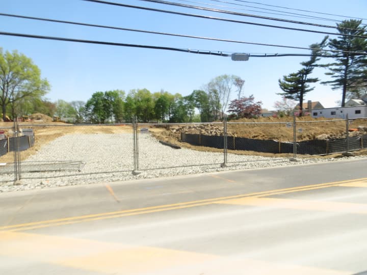 A view of the property on Thursday where the German International School plans an access road for parking off of North Street less than a half-mile south of White Plains High School. Four single-family homes also will be built as rental property.