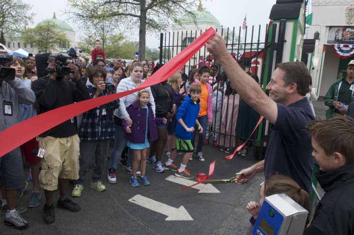 County Executive Rob Astorino cuts ribbon to open Playland for the season.