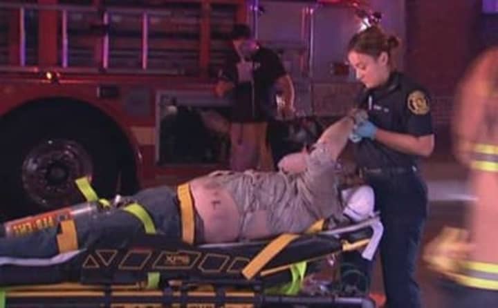 One of the 50 injured in Tuesday night&#x27;s train crash with an emergency responder.