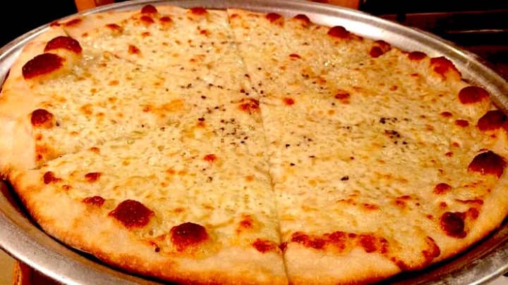 Johnny&#x27;s Pizzeria is known for its thin crust pies.