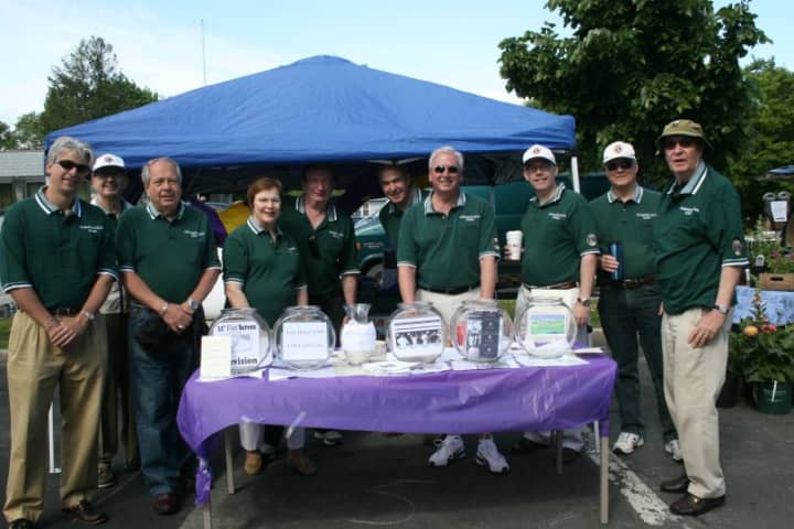The Pleasantville Lions Club prepares to sell tickets at its 2010 event.