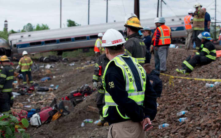NTSB officials on the scene of the Amtrak Train derailment near Philadelphia.