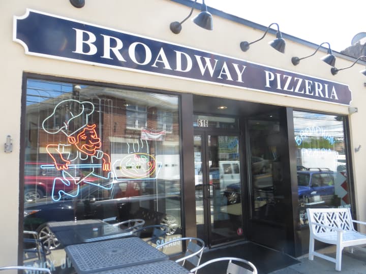 There are tables in front, and on a patio behind Broadway Pizzeria in North White Plains.