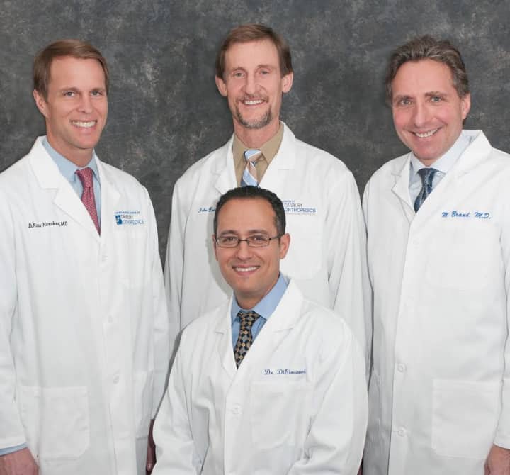 Four physicians at Danbury Orthopedic (back, left to right) Ross Henshaw, MD, John Lunt, MD, Michael Brand, MD, and Joseph DiGiovanni, MD (front) have been named Top Doctors by Connecticut Magazine.