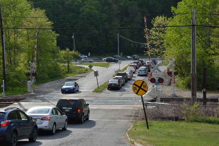 The grade railroad crossing in Chappaqua, pictured with afternoon rush-hour traffic on Friday, May 15.