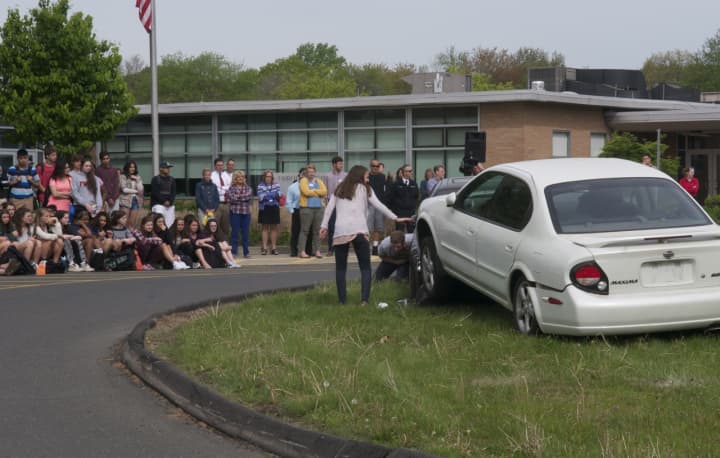The Fairfield Fire Department staged a mock crash at Fairfield Warde High School.