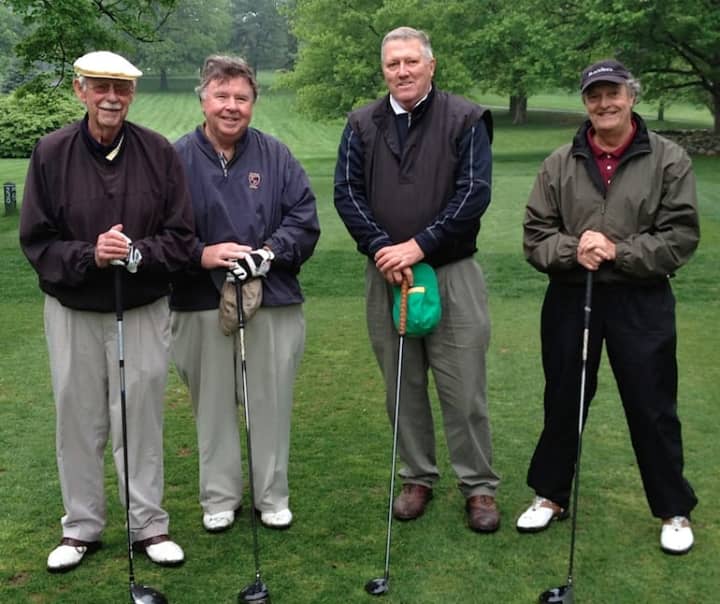 Retired Stamford Probate Judge Gerald M. Fox, Jr. (second from left) who will be honored at the outing, with his golf foursome.