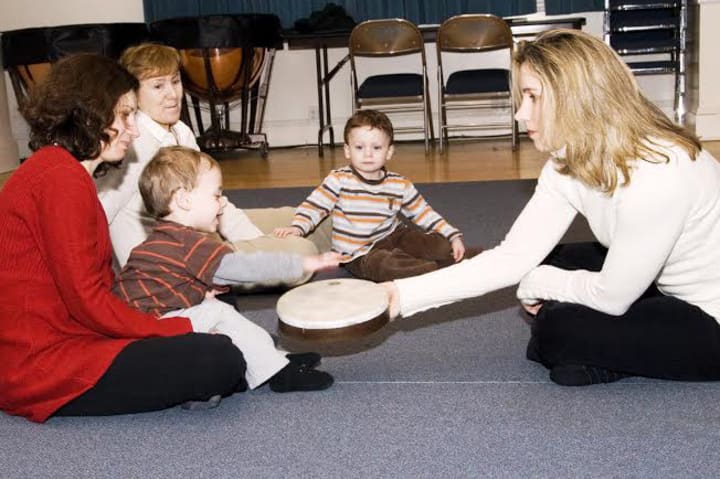 Young students at Hoff-Barthelson Music School in Scarsdale learn music and movement.