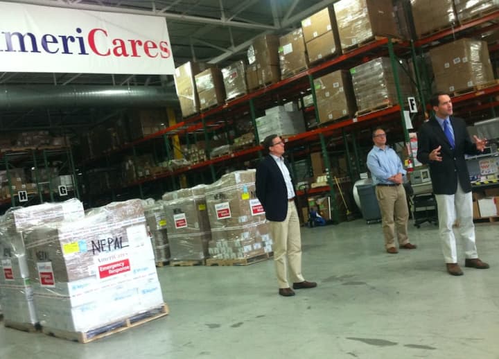 U.S. Rep. Jim Himes, D-4th District, speaks at an event Friday morning at AmeriCares, where he thanked the organization for its response to the Nepal earthquake. Al left is Americares President Michael J. Nyenhuis and Garrett Ingoglia, center.