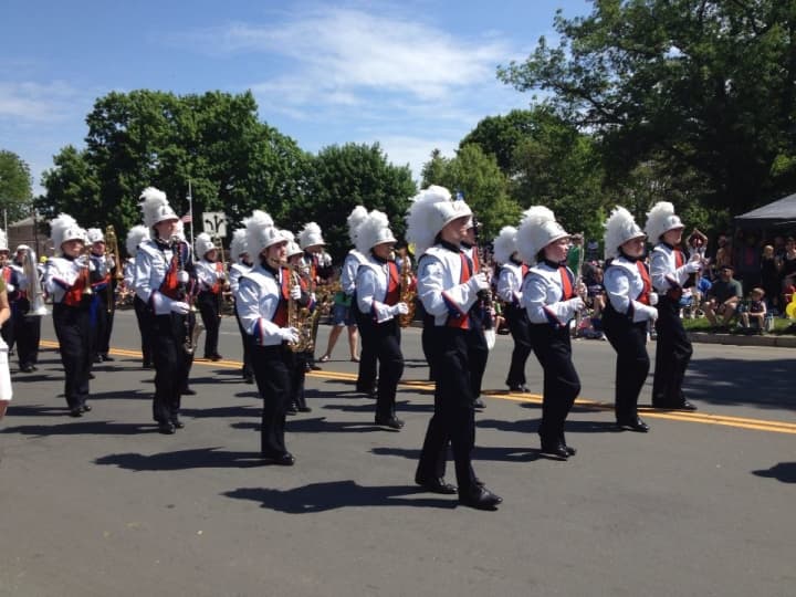 The Danbury High School Marching Band takes part in a Memorial Day parade.