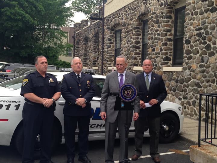 Eastchester Police Lt. Jeff Hunter, Chief Tim Bonci and Town Supervisor Anthony Colavita standing with New York Sen. Chuck Schumer as he introduced legislation for &quot;swatting&quot; incidents.